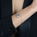 Pulseira Prateada de Cordão Baiano com Coração - Galeria